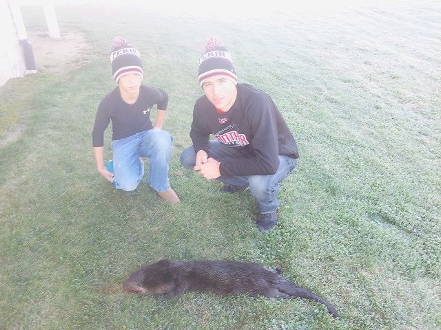 Boys with otter