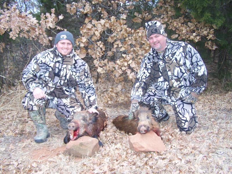 Chad and Scott with their hogs