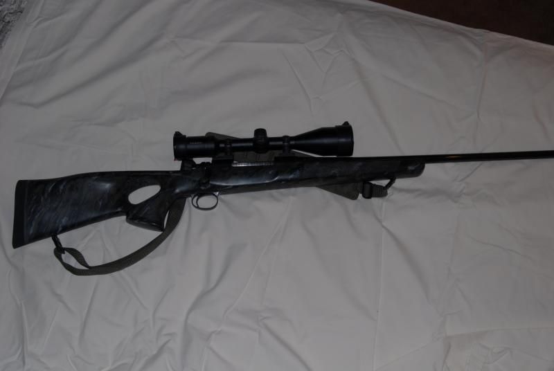 Rem700 .30-06 with custom McMillan thumbhole stock.