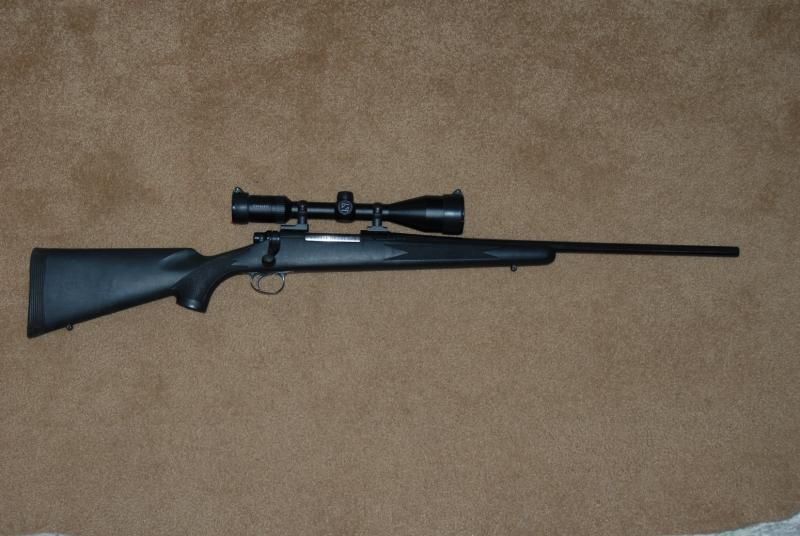 Rem700 .30-06 with factory synthetic stock after 2nd trip to gunsmith.