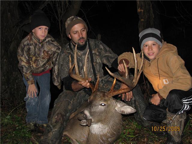 Troy and boys with 2009 Muzz Buck